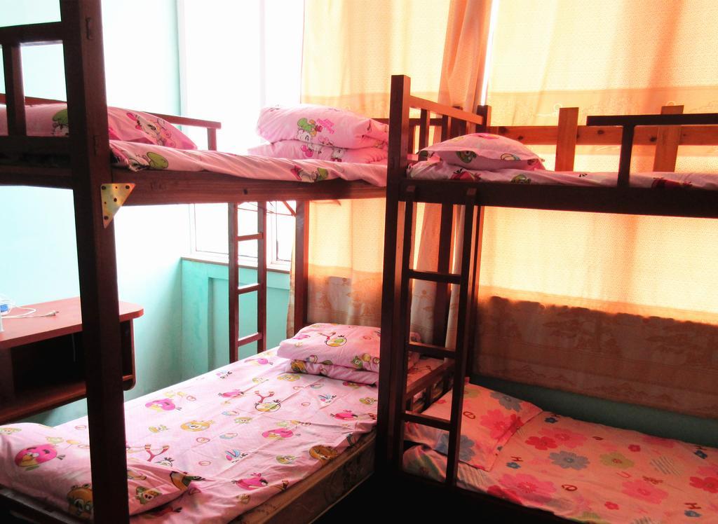 25°C Four Season Youth Hostel Qingdao Room photo